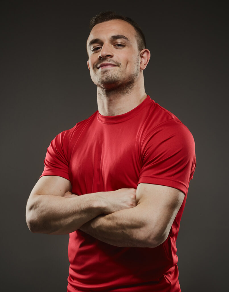 Male styling - model in tight red t-shirt